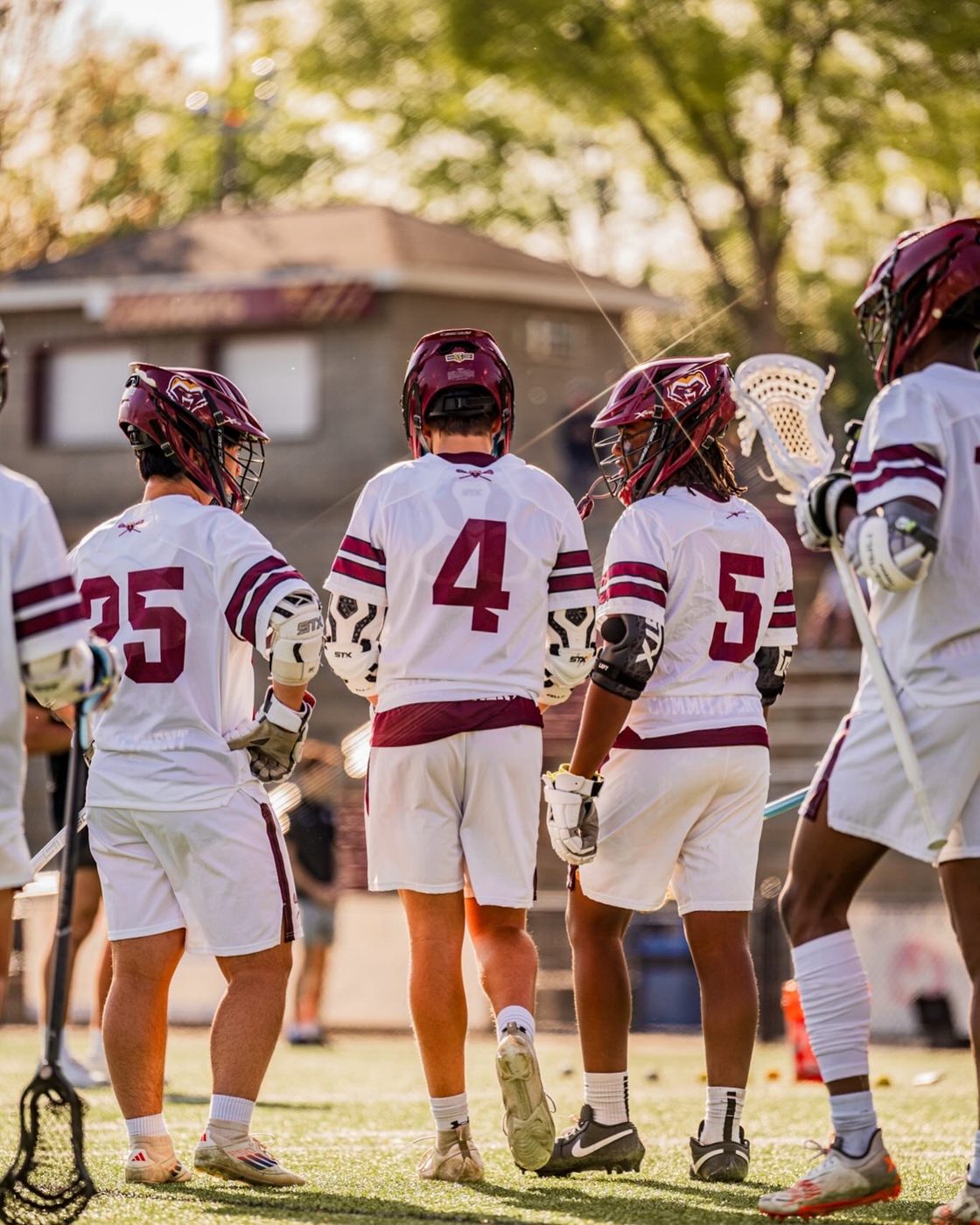 Lacrosse players walking onto the field